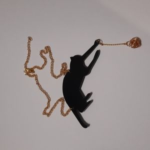 Unique Glossy Black Cat with Dangle Gold Yarn Necklace